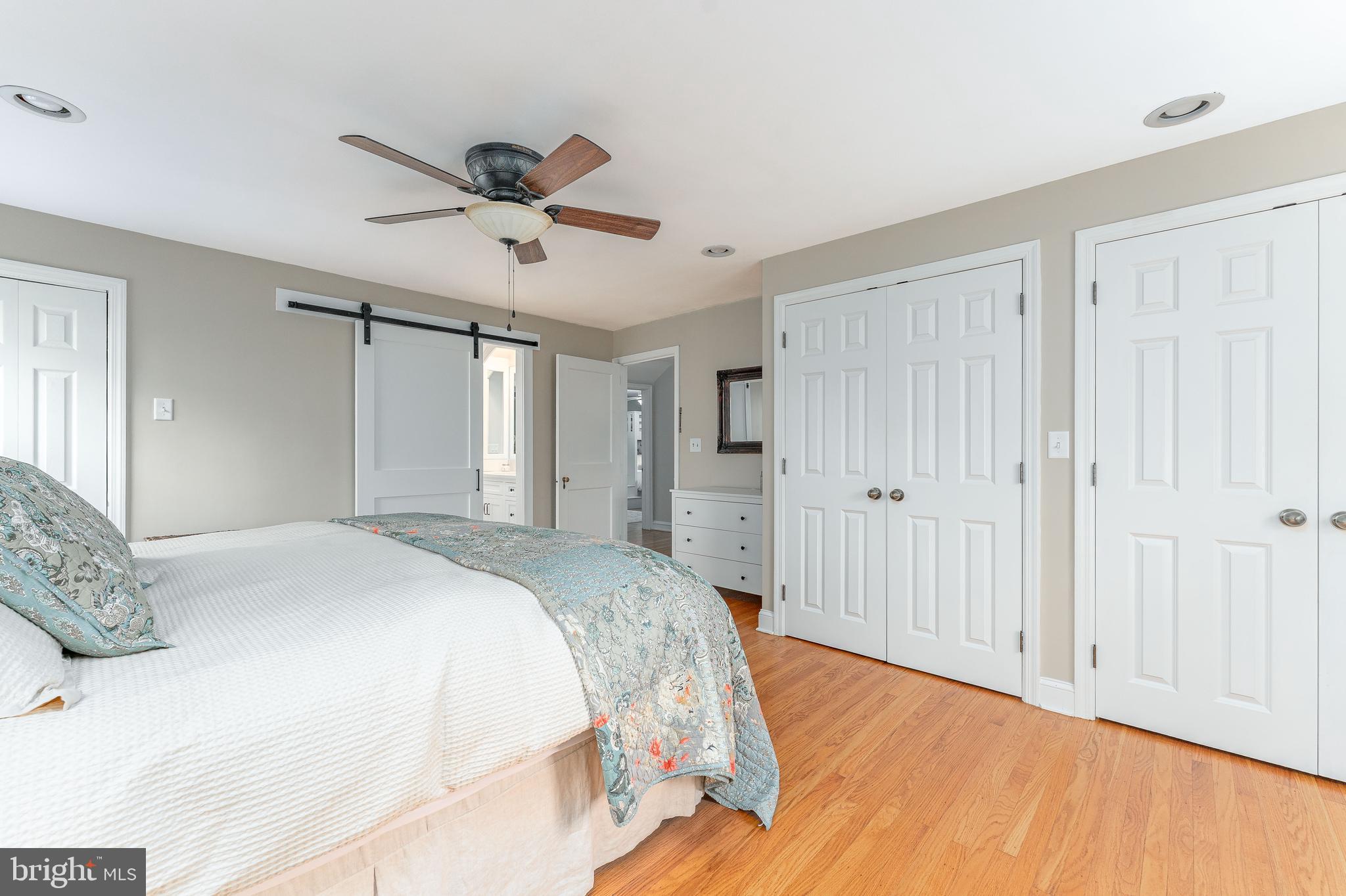 111 Harrogate Road Wynnewood, PA 19096 - Photo 29 of 60 a bedroom with a bed and a ceiling fan