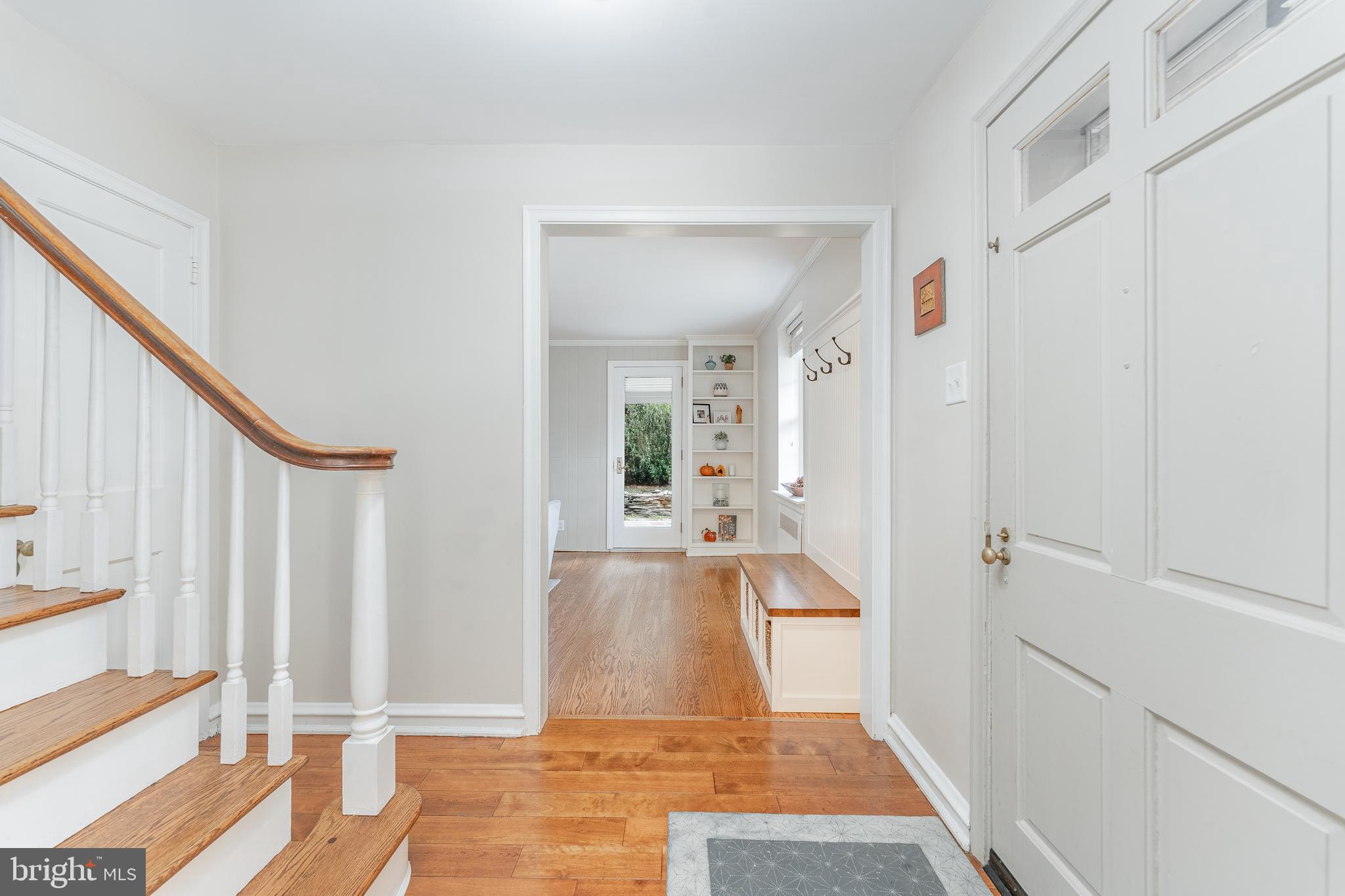 111 Harrogate Road Wynnewood, PA 19096 - Photo 4 of 60 a view of a hallway with wooden floor and staircase