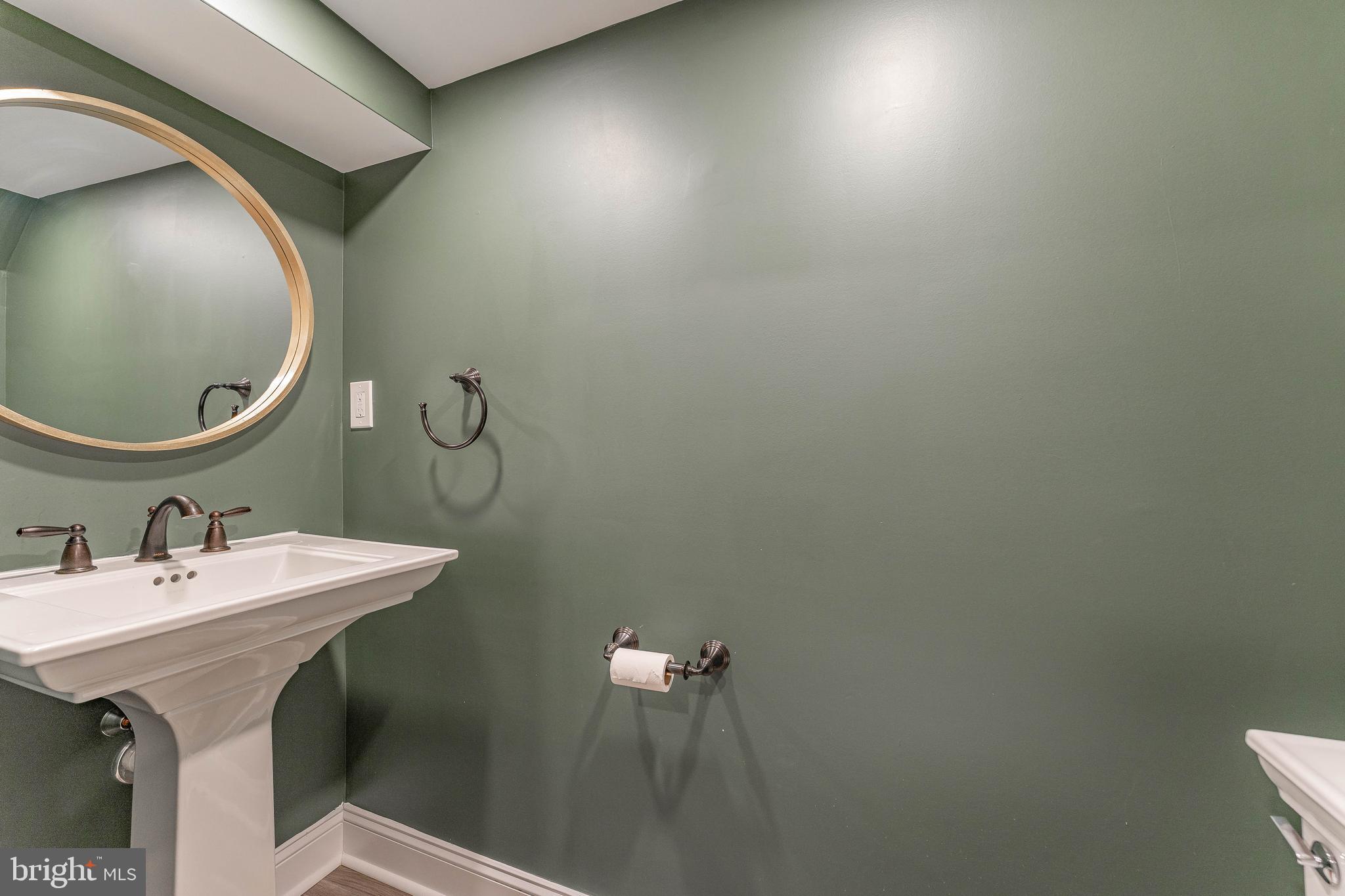 111 Harrogate Road Wynnewood, PA 19096 - Photo 50 of 60 a bathroom with a sink and mirror
