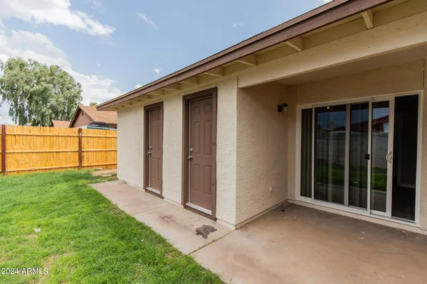 a view of a backyard with a garden
