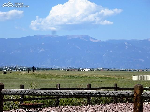 9456 Rockingham Drive Peyton, CO 80831 - Photo 2 of 7 Pikes Peak View From Deck & Yard