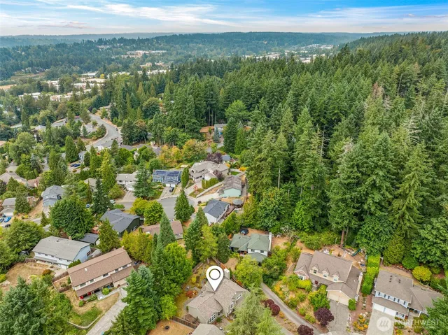 a picture of a bench in front of a wall