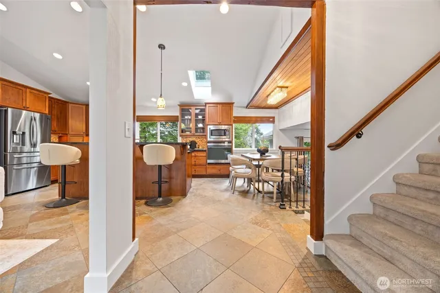 a view of a living room and entry way