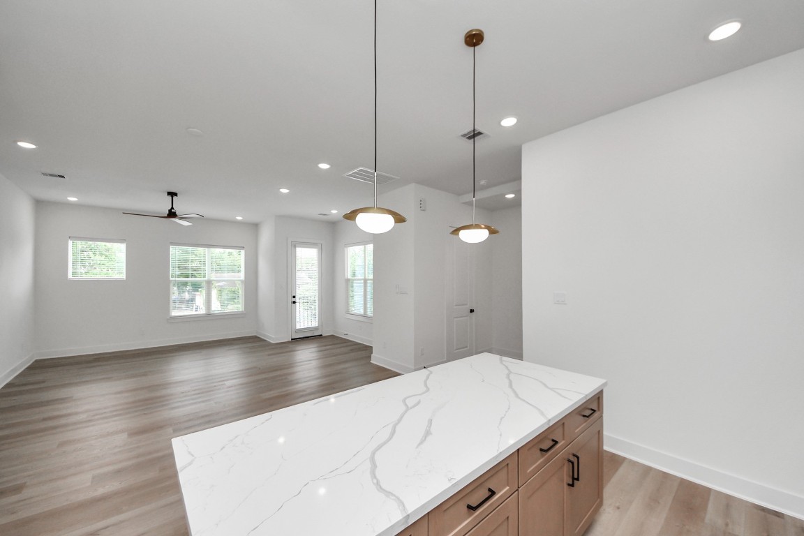 3313 Daphne Street Houston, TX 77021 - Photo 14 of 34 a view of an empty room with window and wooden floor