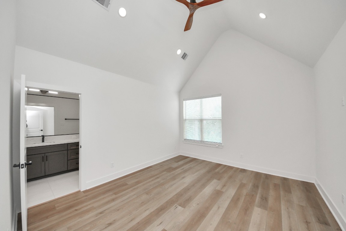 3313 Daphne Street Houston, TX 77021 - Photo 21 of 34 wooden floor in an empty room with a window