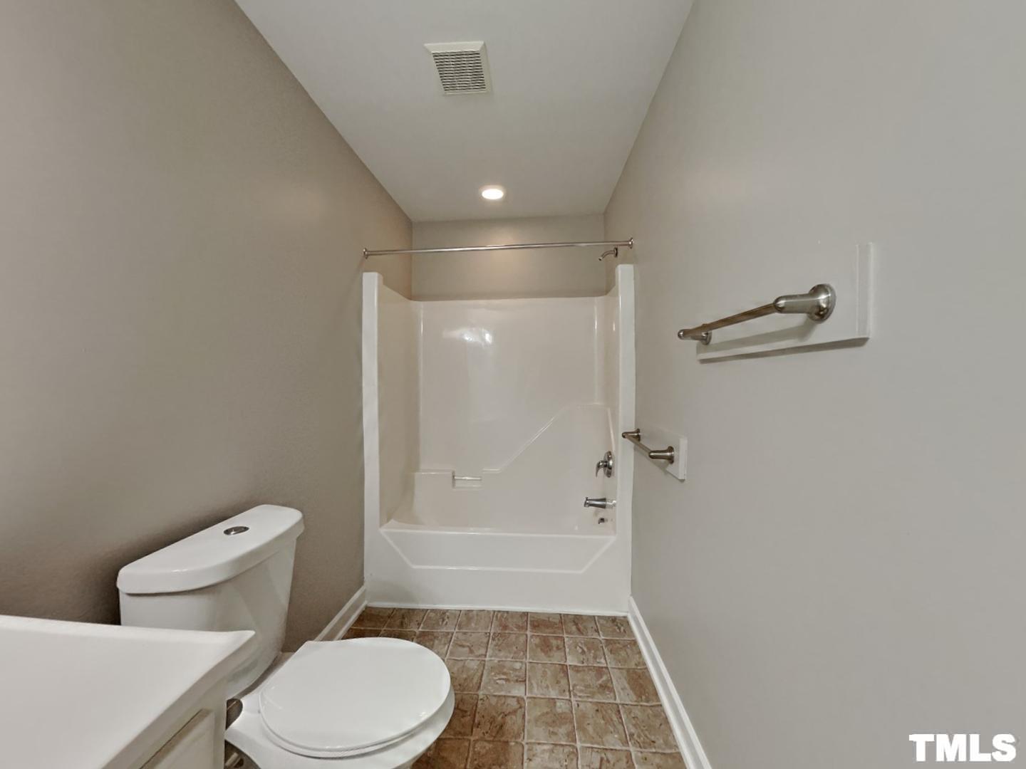 225 Bear Oak Drive Smithfield, NC 27577 - Photo 14 of 17 a bathroom with a toilet and a shower
