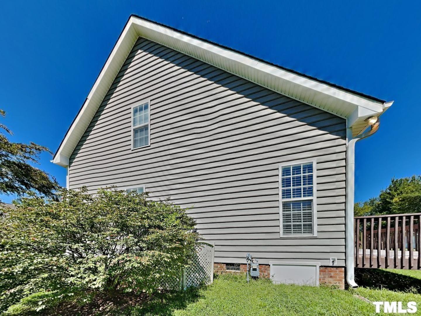 225 Bear Oak Drive Smithfield, NC 27577 - Photo 16 of 17 a view of a house with a yard