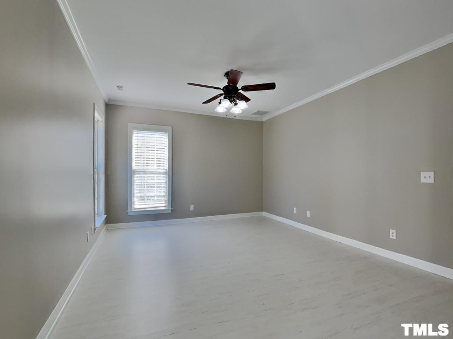 225 Bear Oak Drive Smithfield, NC 27577 - Photo 6 of 17 wooden floor in an empty room with a window