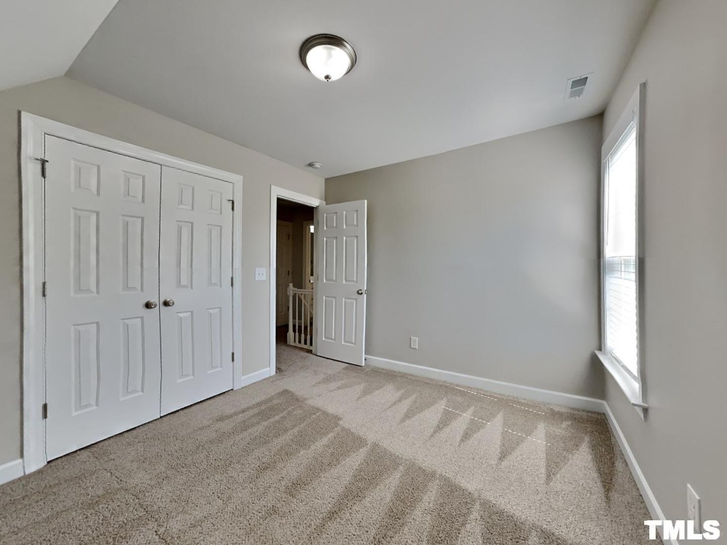 225 Bear Oak Drive Smithfield, NC 27577 - Photo 10 of 17 a view of an empty room