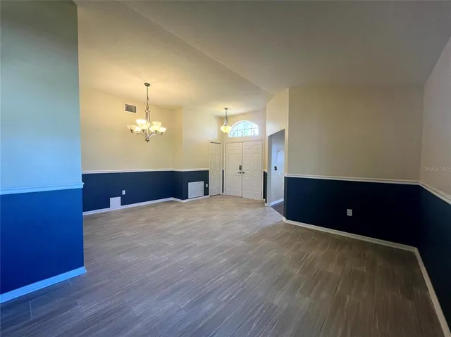 a view of a windows and an empty room