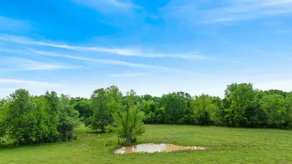 a view of an outdoor space and a yard
