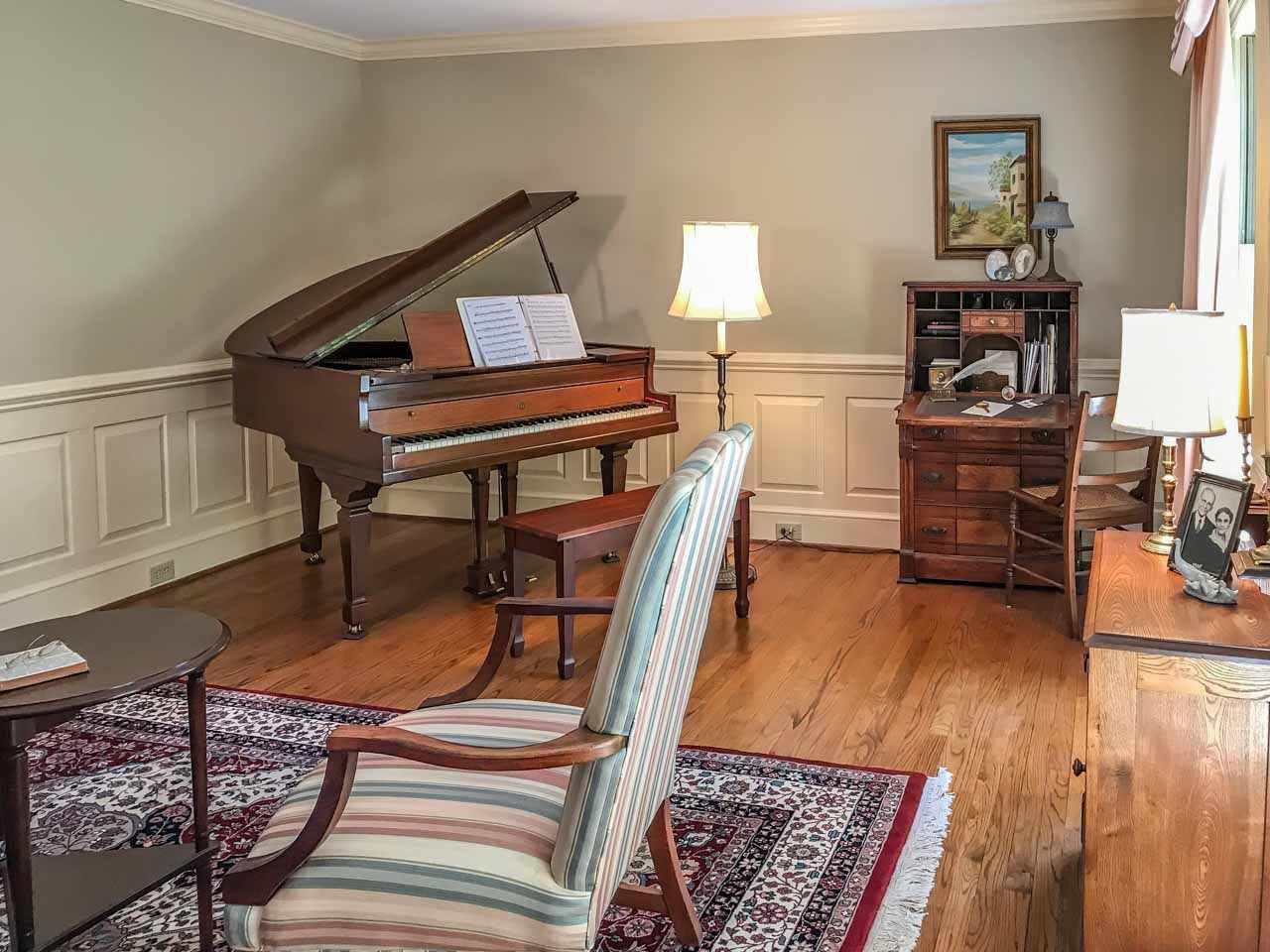 1806 Grande Oaks Road Durham, NC 27712 - Photo 10 of 25 Living Room features true raised paneled wainscoting below the chair rail and beautiful crown molding throughout downstairs. This Living Room space could also be a wonderful home office, music room or library. Living Room