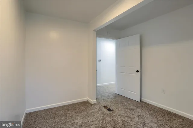 an empty room with closet