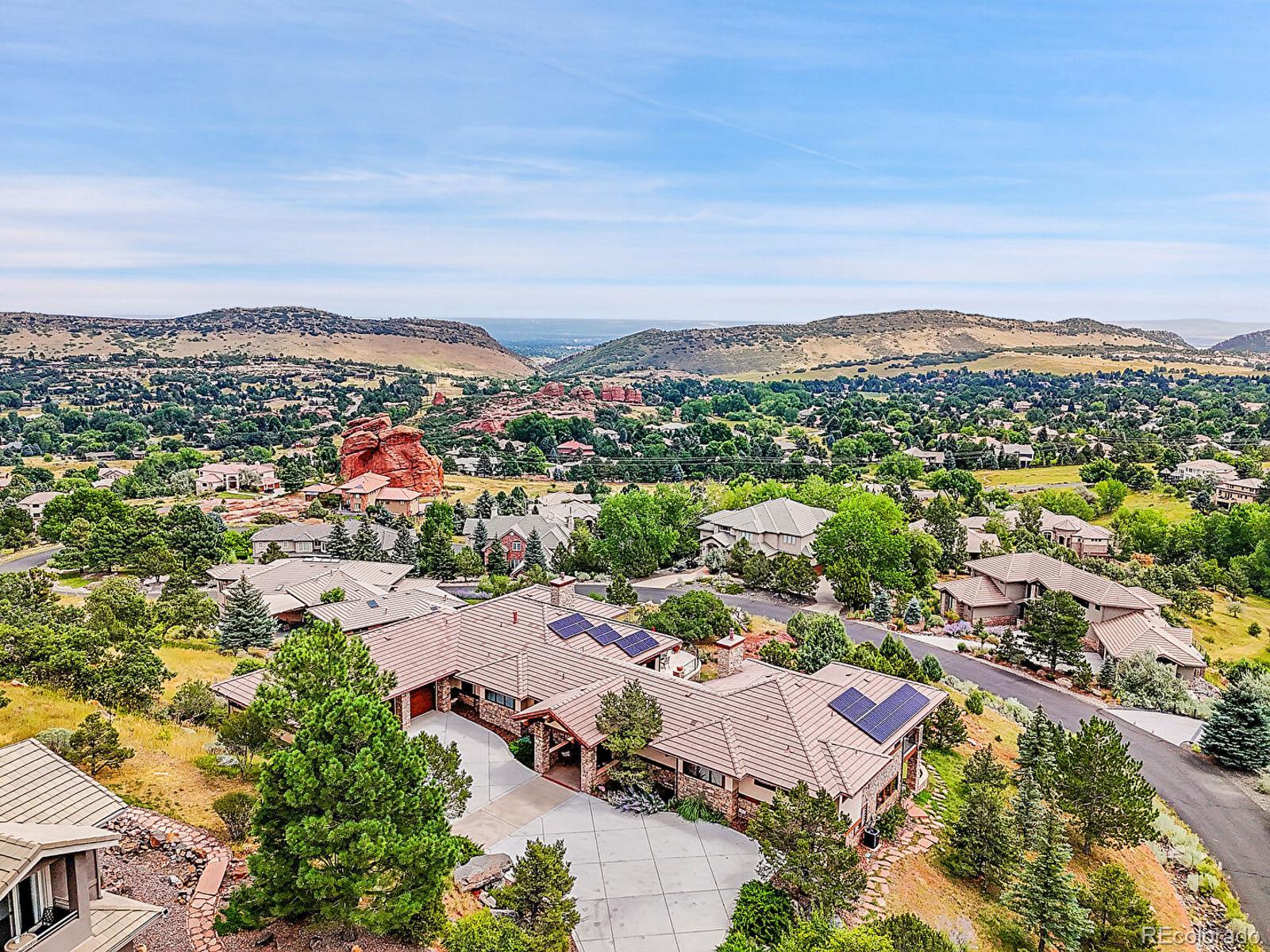 16285 Sandstone Drive Morrison, CO 80465 - Photo 38 of 47 an aerial view of a city with lots of residential buildings