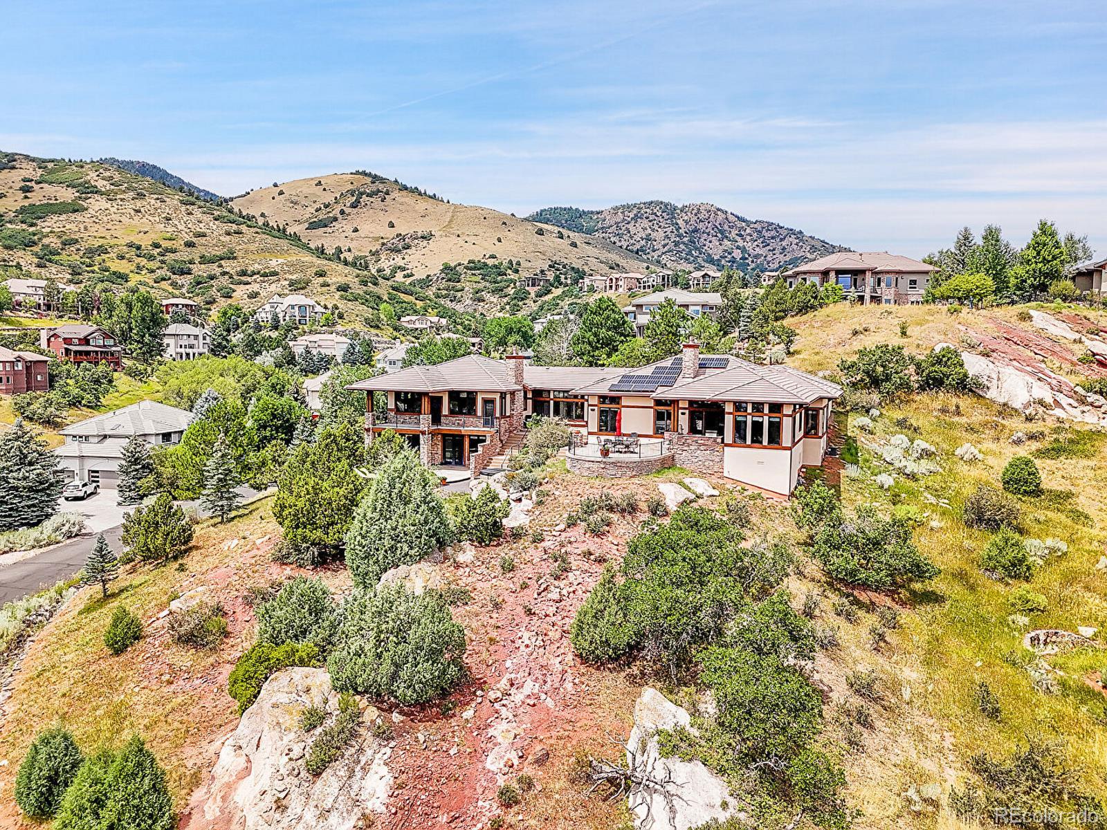 16285 Sandstone Drive Morrison, CO 80465 - Photo 40 of 47 a view of a city with a mountain in the background