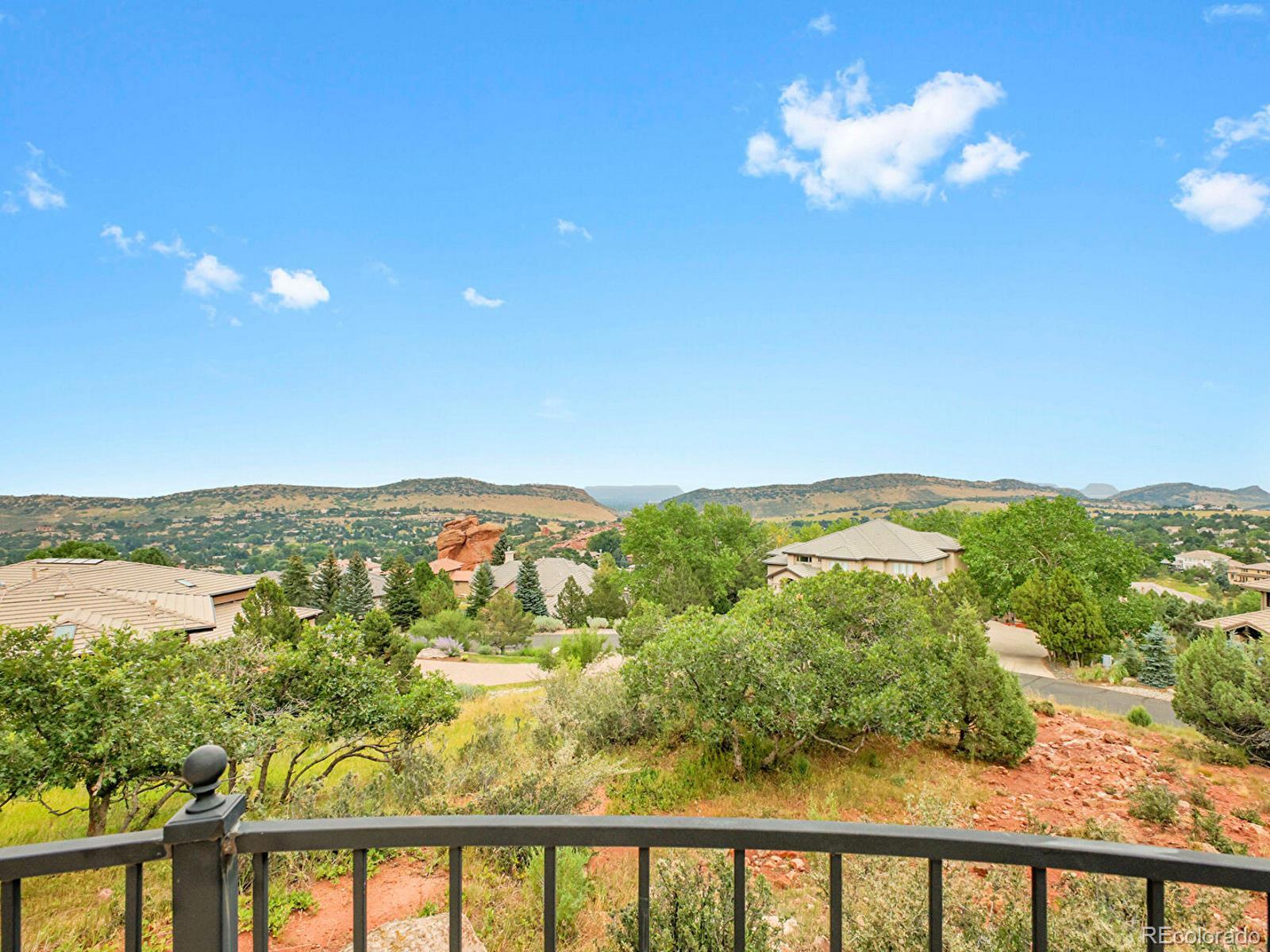 16285 Sandstone Drive Morrison, CO 80465 - Photo 4 of 47 a view of a city from a balcony