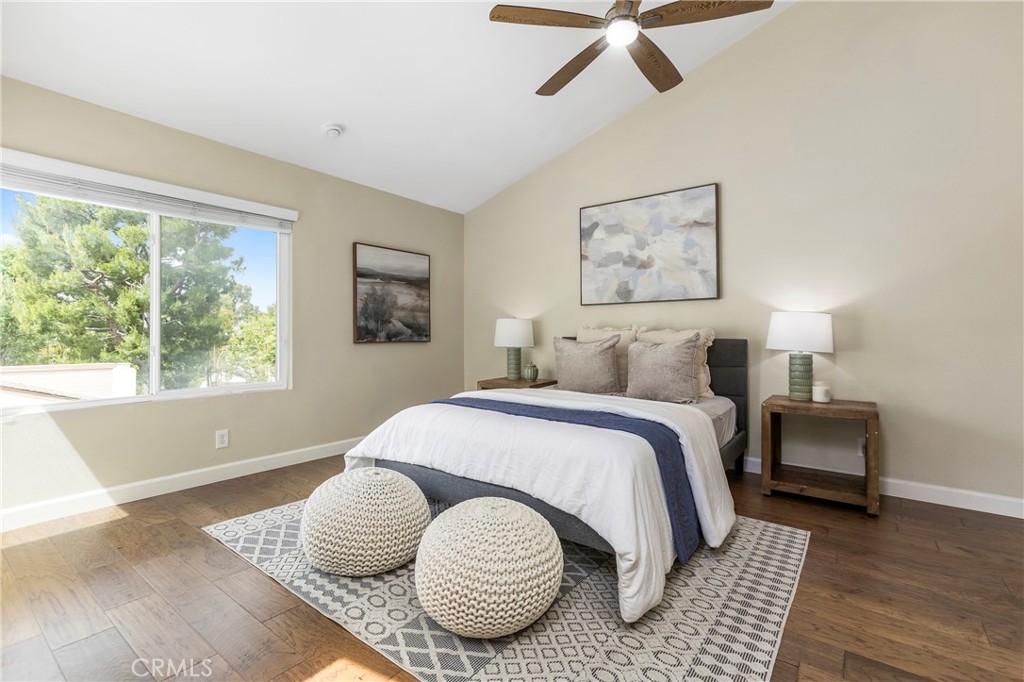 249 Mountain Court Brea, CA 92821 - Photo 16 of 37 a bedroom with a bed and wooden floor