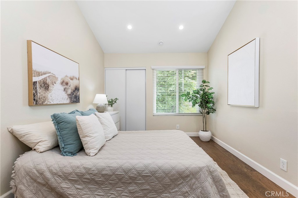 249 Mountain Court Brea, CA 92821 - Photo 21 of 37 a bedroom with a bed and a painting on the wall