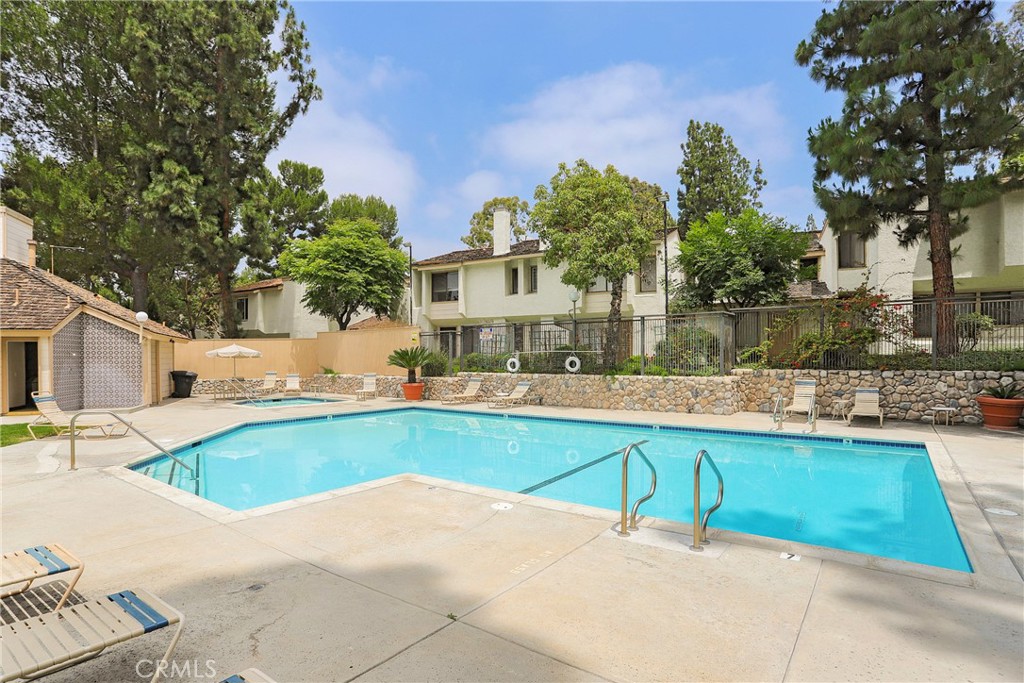 249 Mountain Court Brea, CA 92821 - Photo 30 of 37 a view of a house with pool and a yard