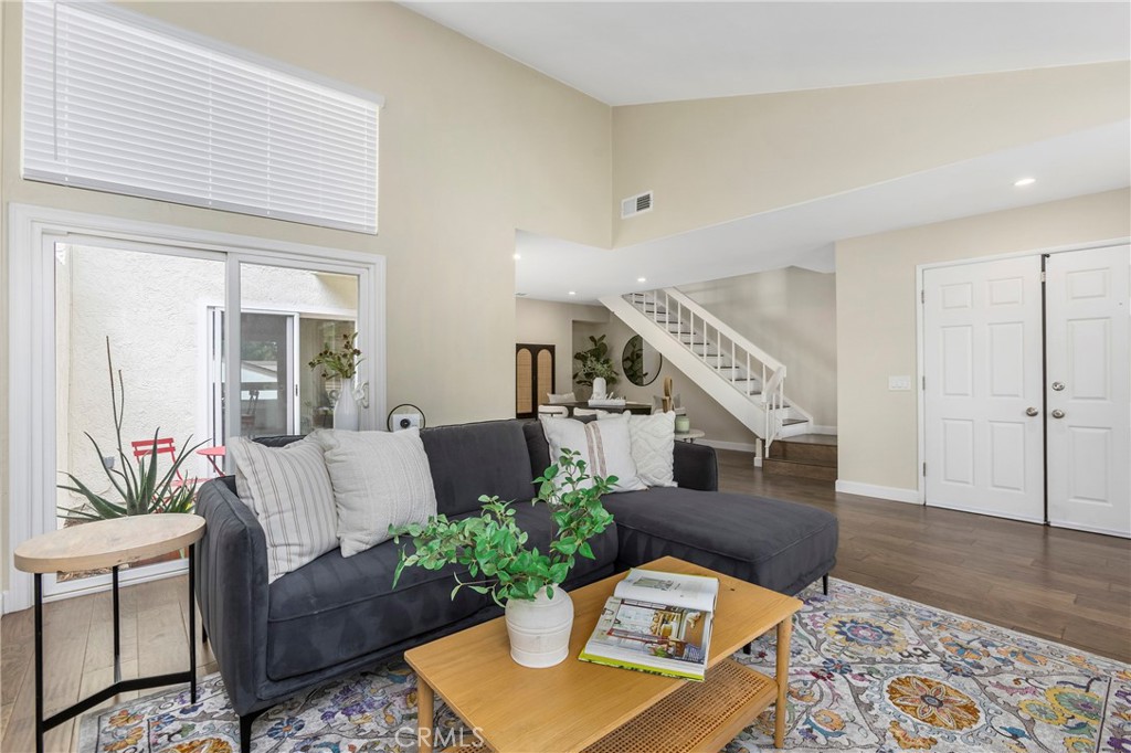 249 Mountain Court Brea, CA 92821 - Photo 3 of 37 a living room with furniture potted plant and wooden floor