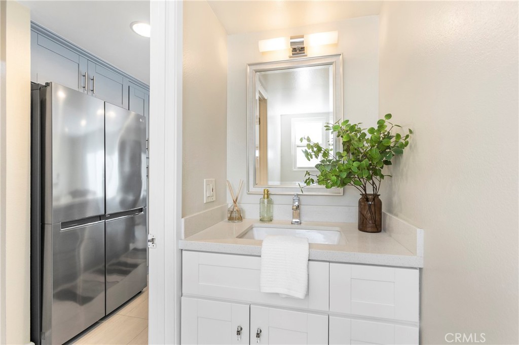 249 Mountain Court Brea, CA 92821 - Photo 10 of 37 a bathroom with a sink a vanity and a mirror