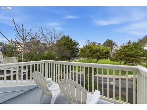 a view of a two chairs in the roof deck