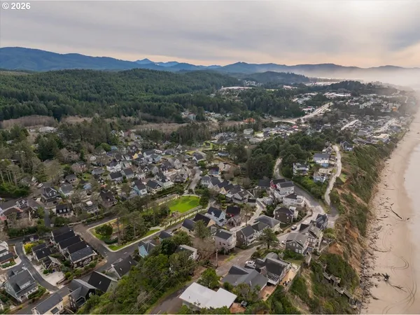 an aerial view of a residential houses and city view