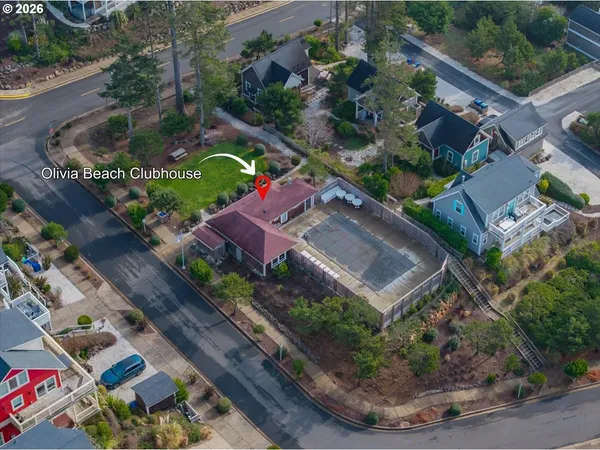 an aerial view of a house with a garden