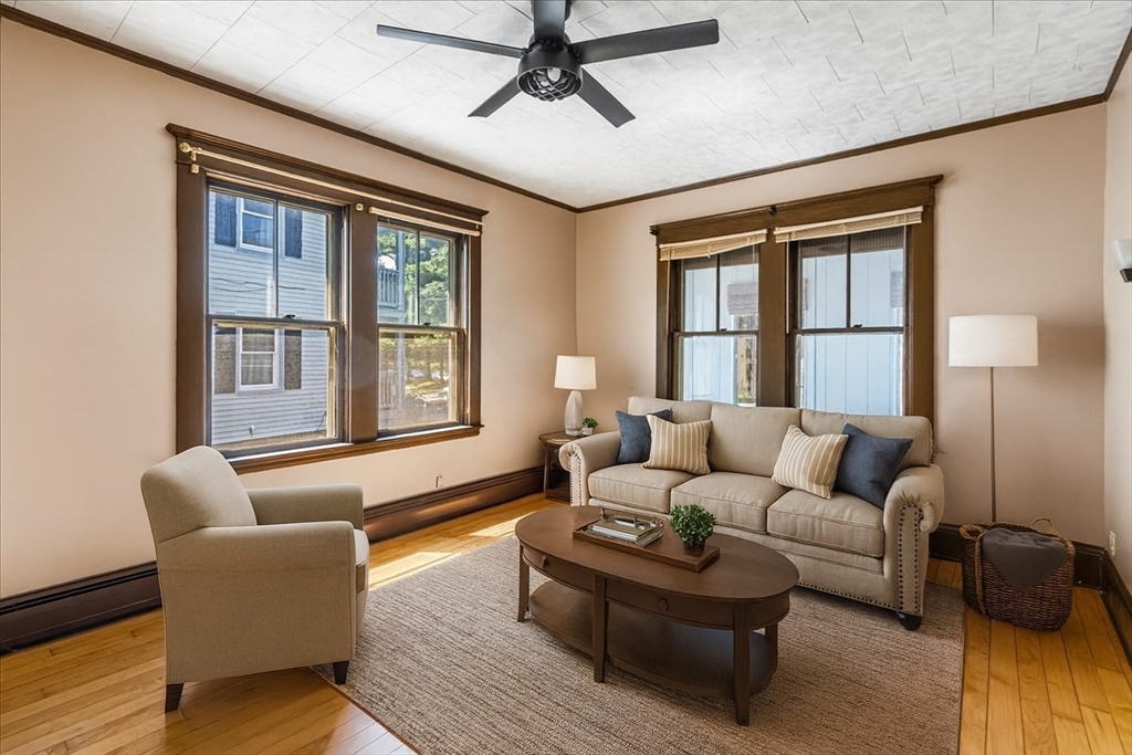 313 Main Street Fairhaven, MA 02719 - Photo 12 of 42 a living room with furniture and a window