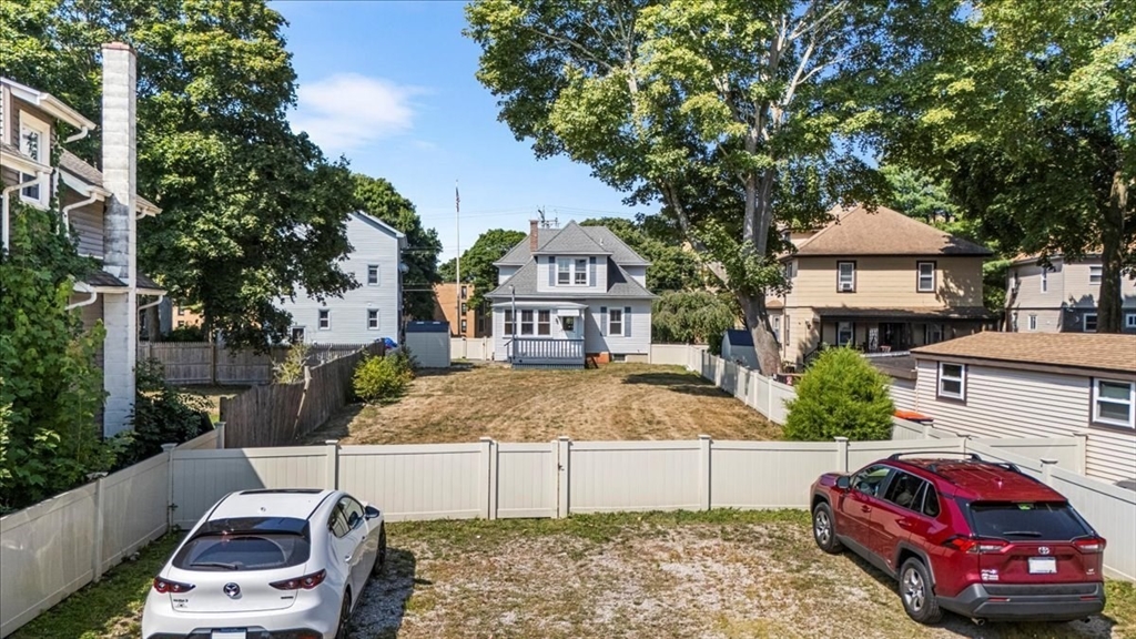 313 Main Street Fairhaven, MA 02719 - Photo 7 of 42 a front view of a house with garden