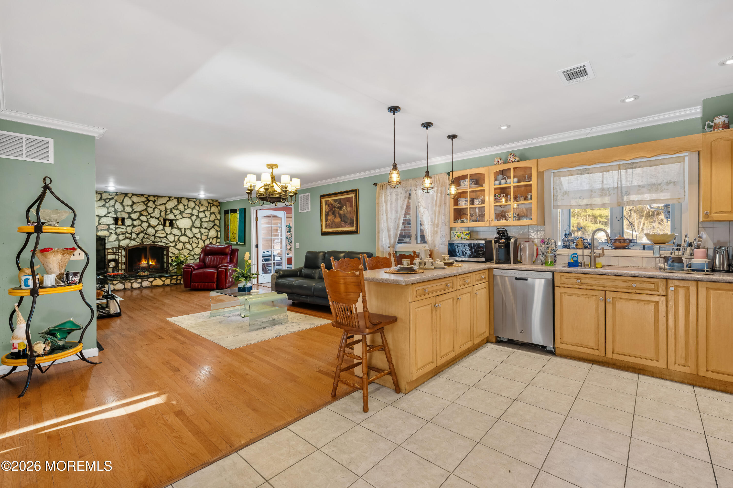 34 Brookside Avenue Old Bridge, NJ 08857 - Photo 11 of 71 a large white kitchen with a large window and furniture