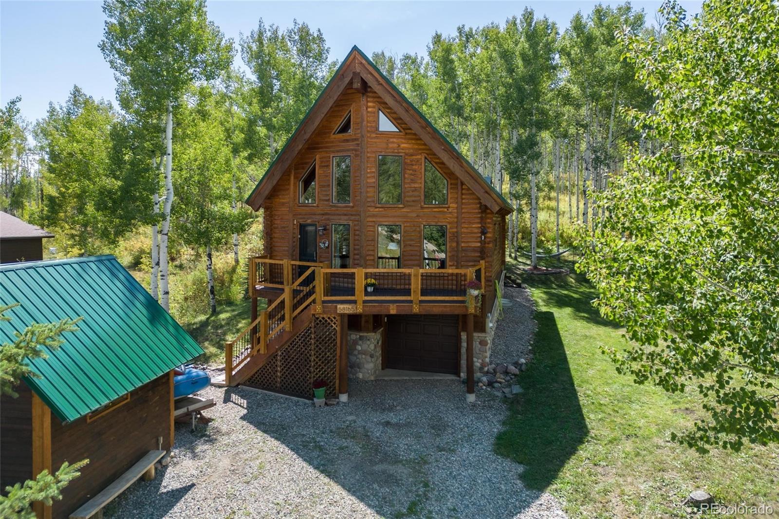 a view of a house with a sink and backyard