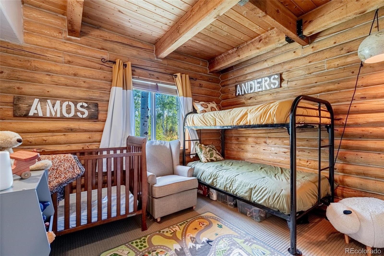 58165 Jupiter Place Clark, CO 80428 - Photo 12 of 34 a view of a porch with furniture