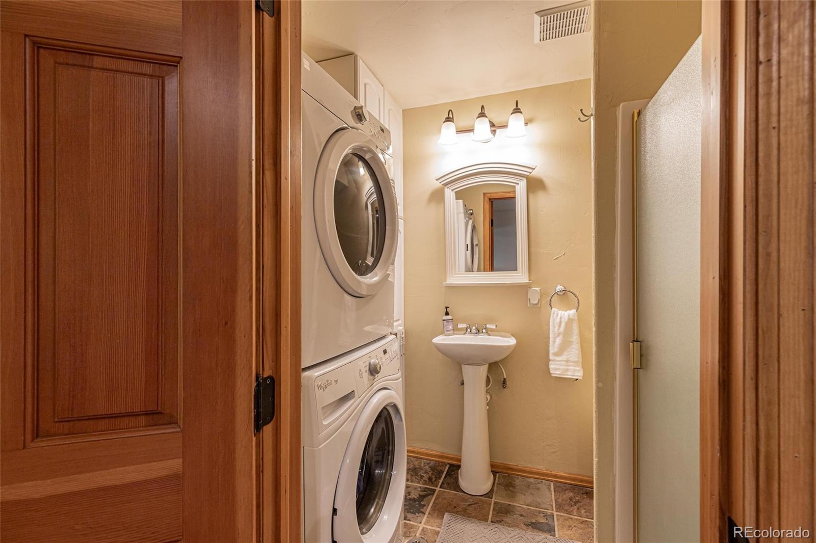 58165 Jupiter Place Clark, CO 80428 - Photo 23 of 34 a room with a washer and dryer