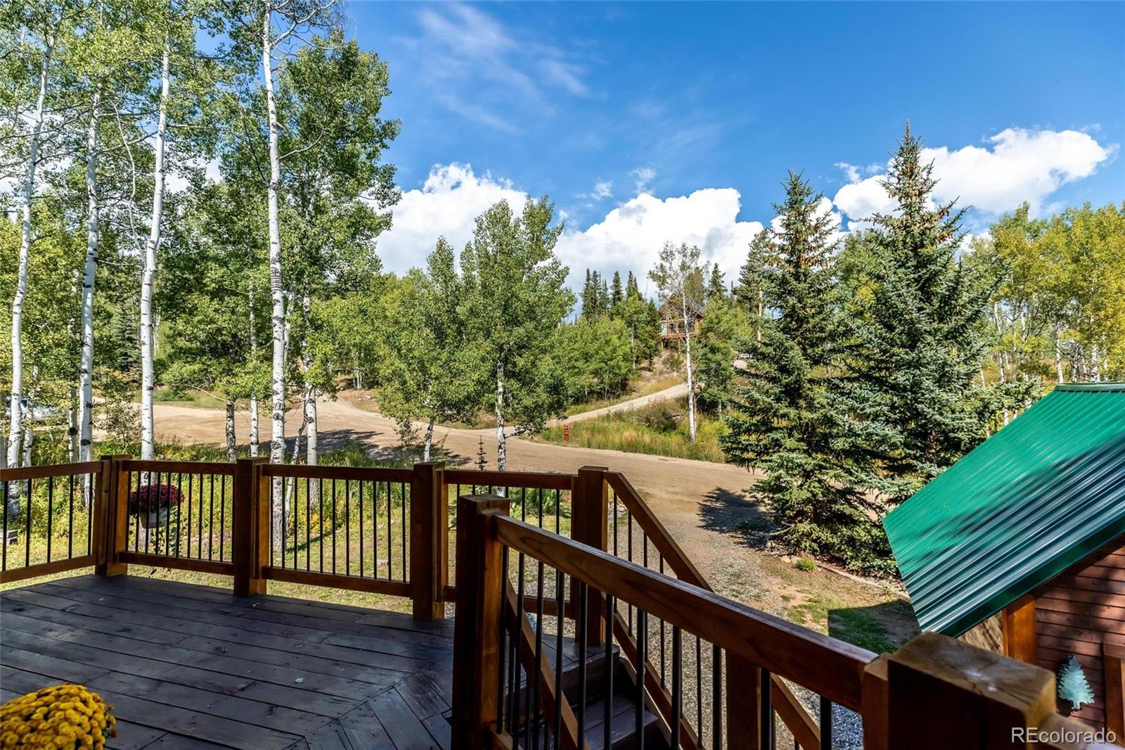 58165 Jupiter Place Clark, CO 80428 - Photo 5 of 34 a view of a balcony with lake view