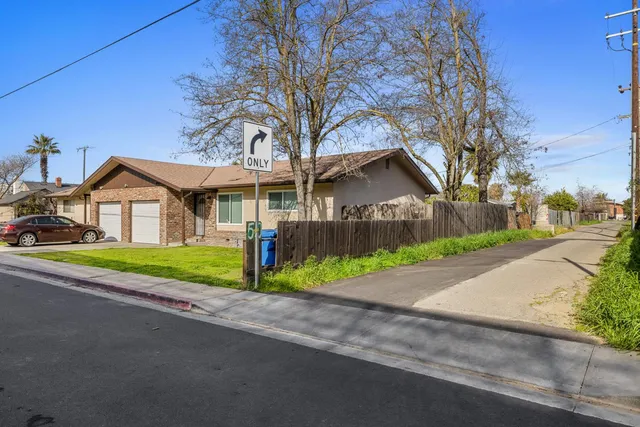 a view of house with outdoor space and street view