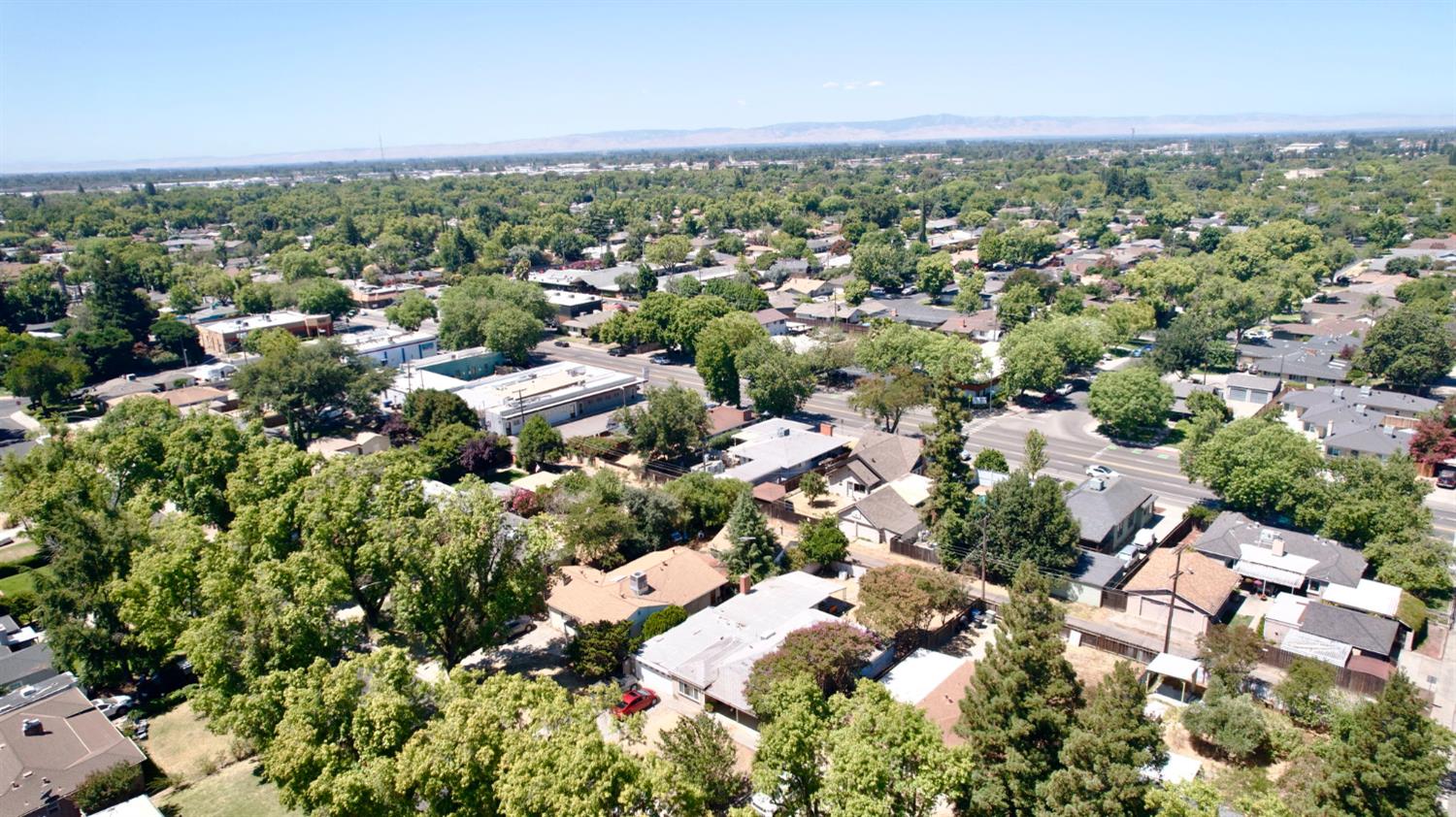 1705 Stetson Avenue Modesto, CA 95350 - Photo 28 of 32 an aerial view of a city with lots of residential buildings