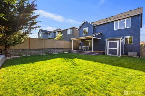 a view of a house with a swimming pool