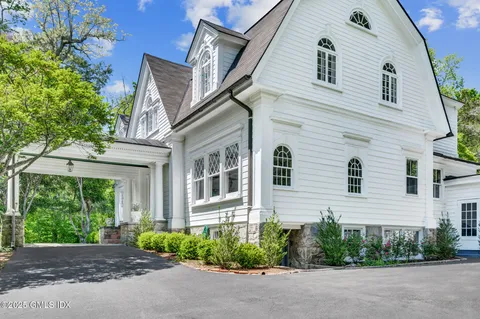 a view of a house with a garden