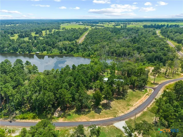 a view of a lake with a city