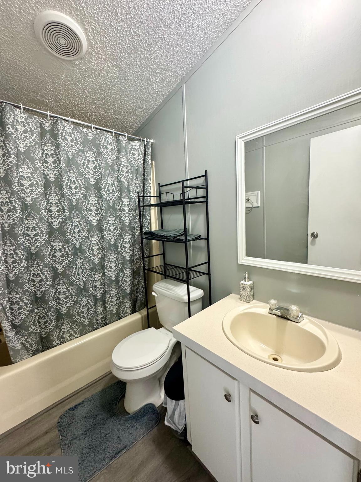 9333 Colonial Mill Drive Delmar, MD 21875 - Photo 21 of 31 a bathroom with a sink toilet and shower