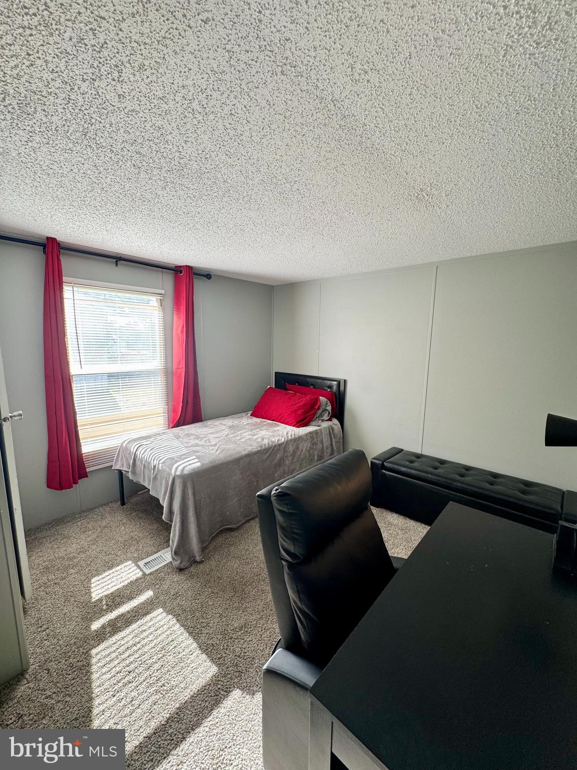 9333 Colonial Mill Drive Delmar, MD 21875 - Photo 22 of 31 a bedroom with a bed and a window