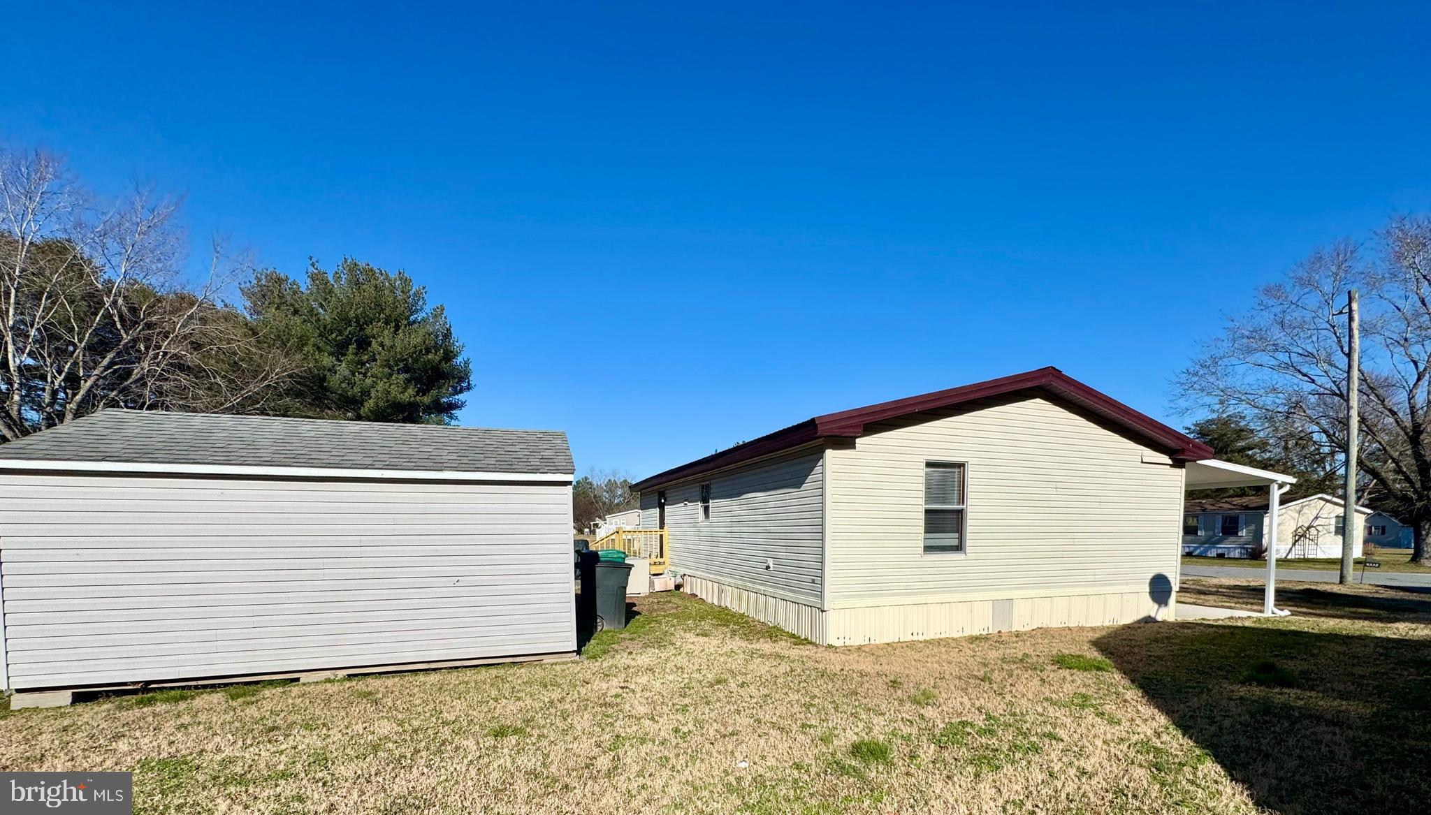 9333 Colonial Mill Drive Delmar, MD 21875 - Photo 28 of 31 a view of a house with a yard