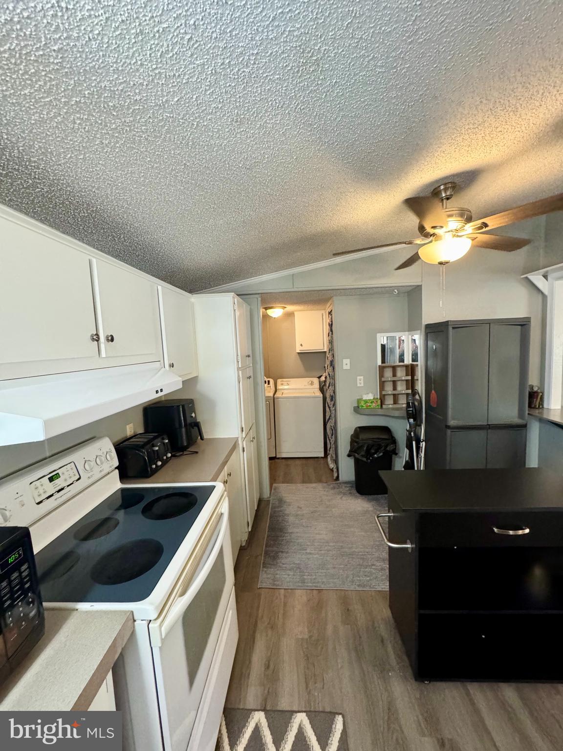 9333 Colonial Mill Drive Delmar, MD 21875 - Photo 10 of 31 a kitchen with a sink and cabinets