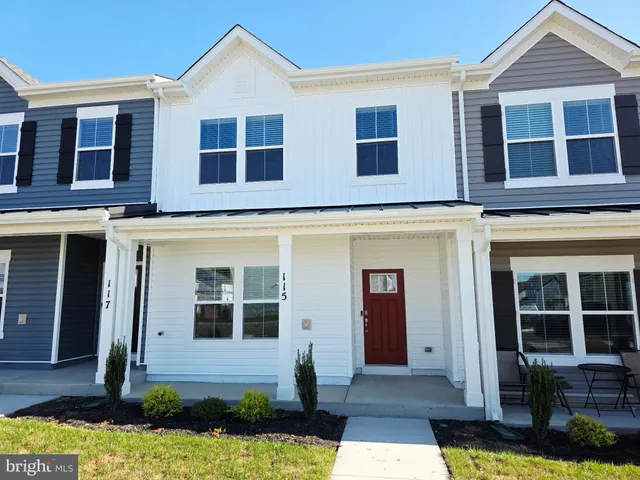 a front view of a house having yard