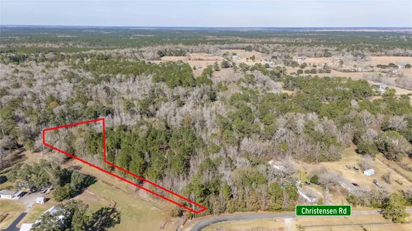 an aerial view of beach and city