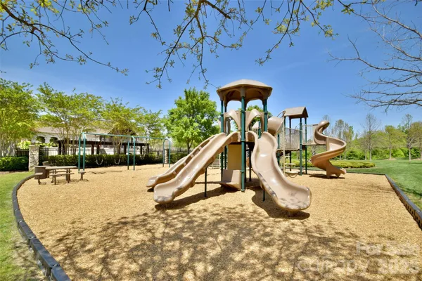 a view of a swimming pool with a slide