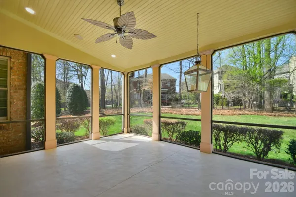 a view of a porch with a large window