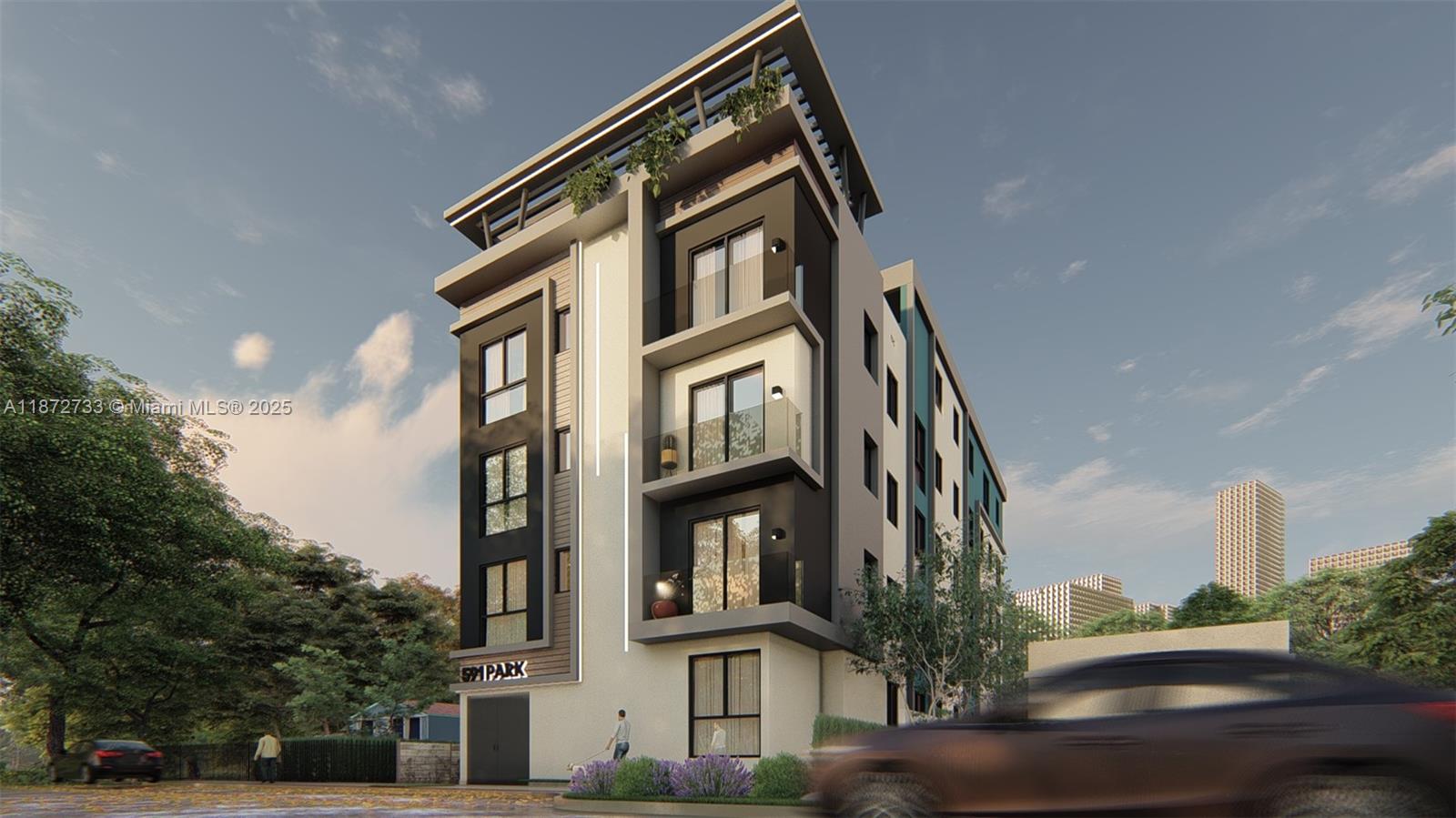 591 Northwest 34th Street Miami, FL 33127 - Photo 12 of 14 a view of houses with a street