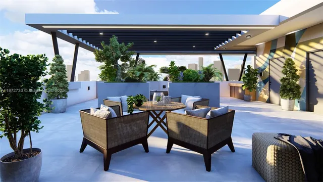 a outdoor living space with furniture and a potted plant